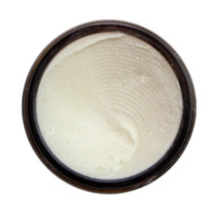 Jar of white cream on a white background