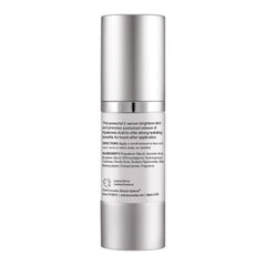 Silver skincare serum bottle with text on a white background