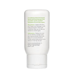 White skincare product bottle with text on a white background