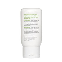 White skincare bottle with text on a white background