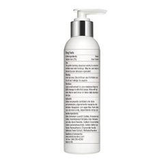 White bottle with pump on a white background