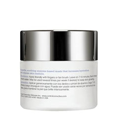 Skincare product jar with silver lid on a white background