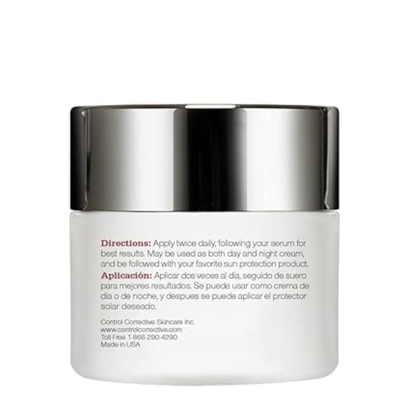 Skincare jar with silver lid and white body on a white background