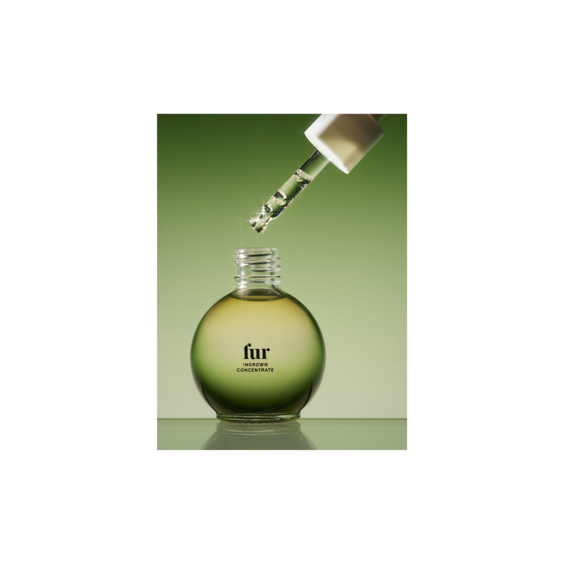 Bottle of Fur Concentrate with dropper on a green background