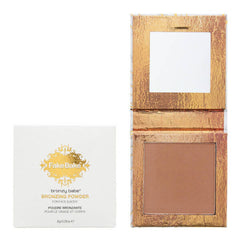 Bronzing powder with packaging featuring the brand 'Fake Bake' on a white background