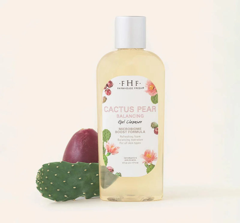 Bottle of Cactus Pear Balancing Gel Cleanser with a cactus and pear on a beige background