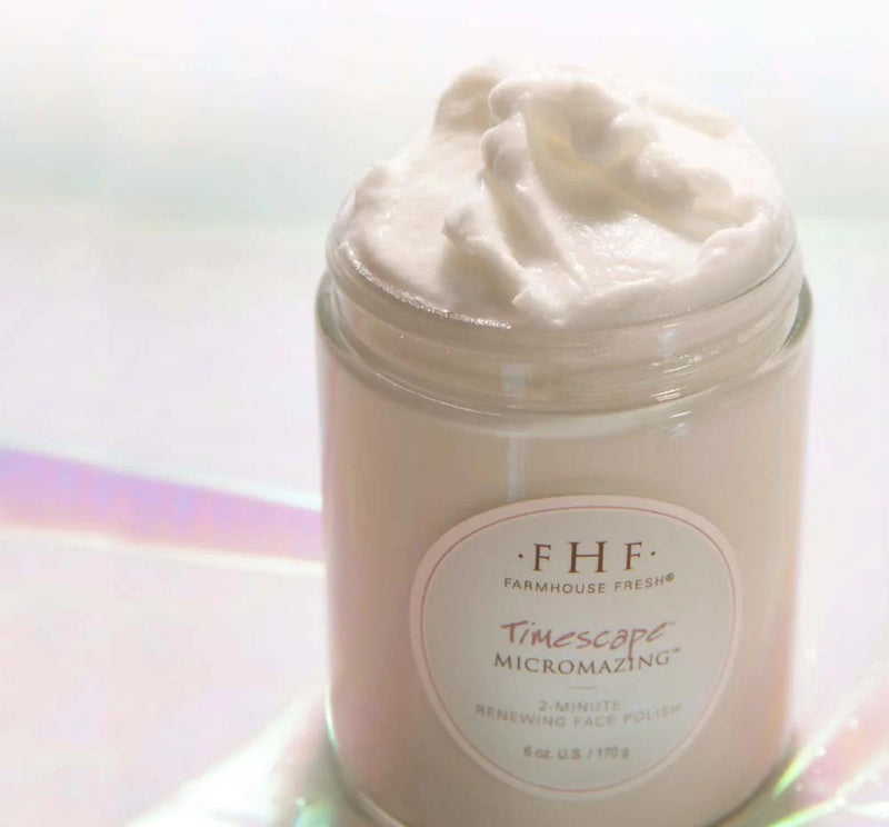 Jar of cream with a visible label on a white background