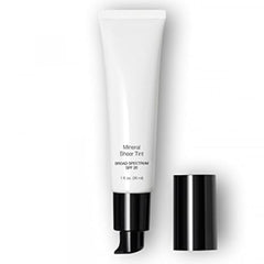 Tube of Mineral Sheer Tint with black cap on a white background