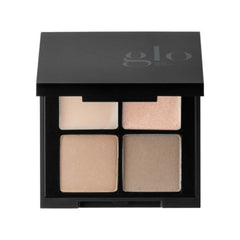 Makeup palette with four beige shades in a black 'glo' box on a white background