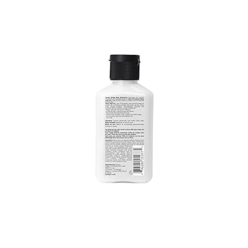White bottle with black cap on a white background