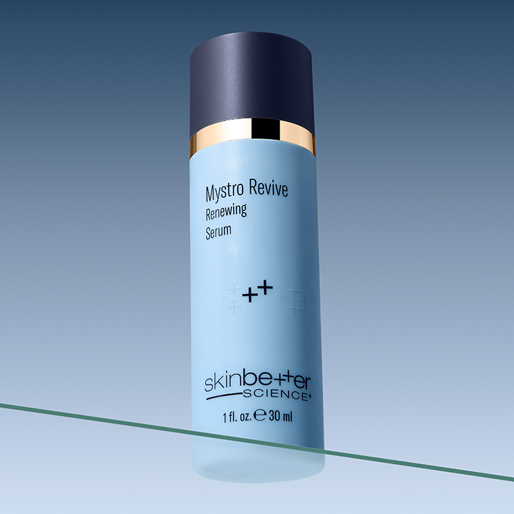Skincare serum bottle labeled 'Mystro Revive Renewing Serum' by 'skinbetter science' on a gradient blue background.