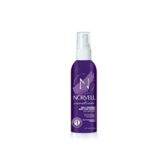 Purple bottle of Norvell sunscreen mist on a white background
