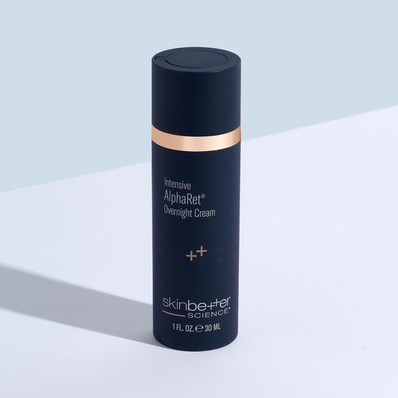 Skincare cream bottle labeled 'Intensive AlphaRet Overnight Cream' by 'skinbetter science' on a light blue background.